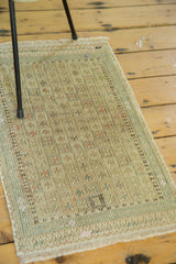 Vintage Jijim runner's hand woven linear geometric pattern and pistachio green zigzag border.