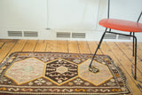 Vintage Turkish Kilim runner, geometric medallions in blush, brown, bronze, and ivory.