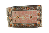 Hand woven Turkish Kilim rug with peach field and bold geometric triple medallions.
