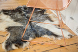 Soft angora skin rug featuring luxurious ivory, silver, and charcoal black fur.