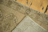 Hand-knotted back and secured side edge of the vintage Oushak rug runner.