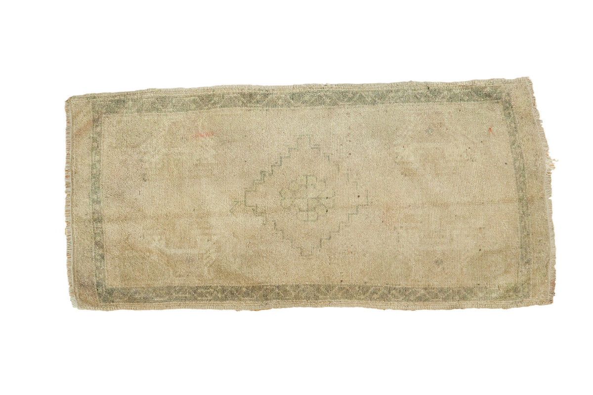 Vintage Oushak runner: sand, beige tones, faded stepped medallion, oxidized green border.