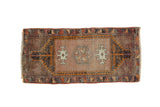Hand knotted Vintage Oushak runner, subtle medallion, dusty blush, charcoal, and ivory geometric motifs.