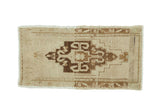 Hand knotted vintage Oushak runner featuring bronze ram's horn medallion, 1'5