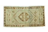 Vintage Oushak runner with floral medallion, pinwheel field, pale bronze, ivory, seafoam green, 1'7