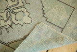 Vintage Oushak runner detail: pale celadon green pile, charcoal pattern, and hand-knotted back.