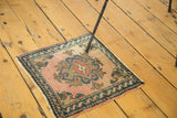 Square vintage Turkish Oushak rug mat, apricot blush medallion and meandering leaf border.