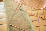 Hand knotted vintage Oushak runner pile with soft pale bronze and peach apricot motifs.