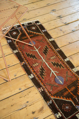 Hand knotted Vintage Oushak runner with diagonal serrated leaves, burgundy copper, and violet hues.