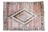 Vintage distressed Persian Baktiari carpet with multi-layered diamond mosaic in cinnabar, green, blue.