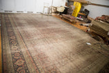 Threadbare texture, Herati pattern, and classic turtle border on a distressed vintage Kaisary carpet.