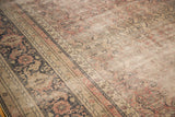 Distressed texture with classic turtle/samovar border motif in earthen tones on a Turkish Kaisary carpet.