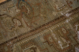 Distressed antique Persian Malayer rug detail: moss green, brown, exposed foundation.