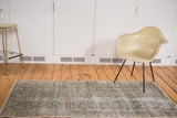 Early 20th century distressed Persian Malayer runner with a faded teal Herati motif.
