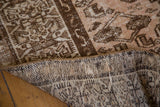 Hand-knotted foundation and distressed gold, peach, brown pile of Malayer style rug.