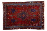 Antique Persian Afshar rug, ruby red field, sapphire blue geometric fish motifs, gem-tone colors, 3'5