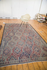 Hand-knotted Jijim carpet's rectilinear geometric lattice pattern, with secure dark brown side.