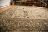 Vintage Mahal carpet with even wear to knot heads, showing muted beige field and brown Harshang design.
