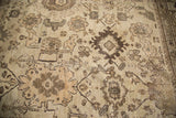Harshang design in wooded tones on a dusty grey field with even wear.