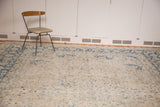 Vintage Persian Tabriz field, ornate pinwheel and palmette designs in antique ivory and medium blue.
