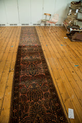Vintage Lilihan runner at full length, showing its repeating floral spray pattern on a dusty blush field.