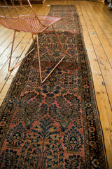 Full length of a vintage Persian Lilihan runner displaying its classic floral spray pattern.