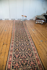 Antique Karabagh runner with repeating Herati design in navy, coral, and antique ivory.