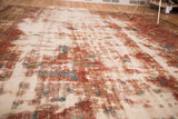 Distressed Persian Heriz rug showcasing worn texture, faded red motifs, and cream foundation.