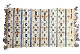 Ivory and cobalt blue Moroccan hand-woven wedding blanket with textured pile, and metal sequins.