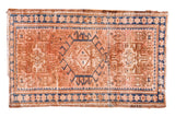 Hand-knotted Vintage Karaja rug, peach field with blue and ivory geometric medallion.