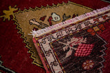 Vintage Oushak rug detail: hand-knotted fringe, woven back, and cherry red pile.