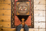 Blush, brown, orange Oushak rug: framed geometric medallion, serrated spandrels.