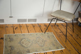 Vintage Oushak rug with celadon green, slate blue serrated diamond medallions and subtle abrash.