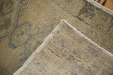 Vintage Oushak rug corner showing hand-knotted pile, secure edges, and abrash.