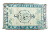 Hand knotted Vintage Oushak Mat, ivory field, floral medallion, teal, mauve, celadon, 2' x 2'11