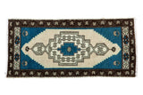 Vintage Oushak rug with a geometric medallion, aqua blue, pale ivory, and charcoal brown, 1'7