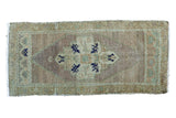 Hand-knotted Vintage Oushak mat, faded mauve field, ivory medallion, blue motifs, 1'7
