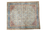 Distressed Oushak carpet: allover henna plant lattice on ivory, sky blue, blush, terra cotta.
