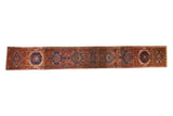 Vintage Karaja runner, traditional repeating gul motif in brick red, navy, and teal.