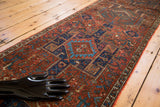 Traditional repeating gul motif on Vintage Karaja runner, with brick red, navy, teal.