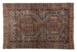 Vintage Shiraz rug featuring double center medallion, rams horn relief, chestnut, slate blue, rust.