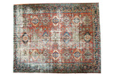 Distressed vintage Karaja carpet with repeating multi-medallion pattern in rich jewel tones.