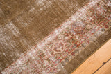 Distressed sage field, revealing white foundation, with a faded red and ivory Mahal border.
