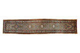 Vintage Serab runner with repeating geometric medallions, blue mehrab niches, in camel, madder red, and sky blue.
