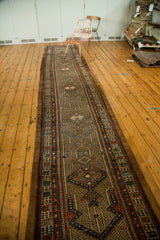 Geometric border and blue mehrab niche detail on the vintage Persian Serab runner.