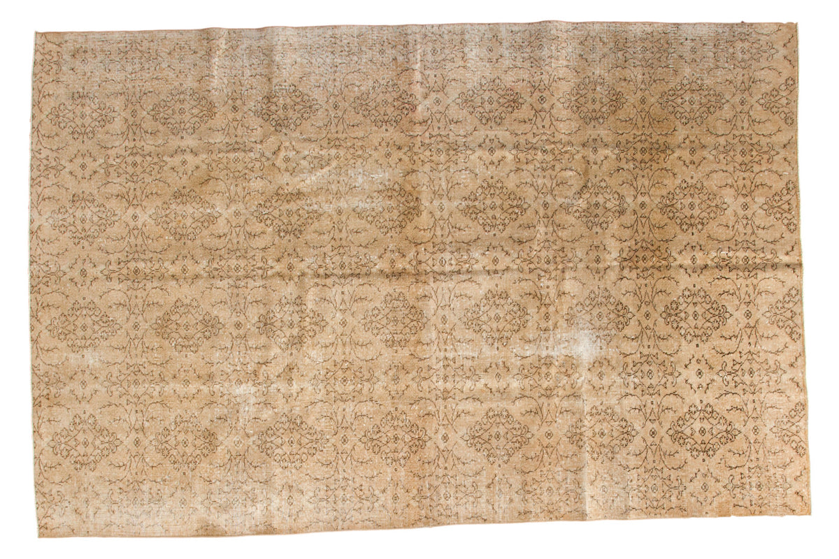 Distressed Vintage Oushak carpet, muted ivory and brown shadow medallion pattern, 6'7" x 10'.