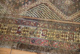 Serab runner geometric border with pale gold, dark raspberry red, and earthen tones.