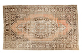 Distressed Vintage Oushak carpet, oversized oblong medallion with vinery, faded apricot and brown, 6'10