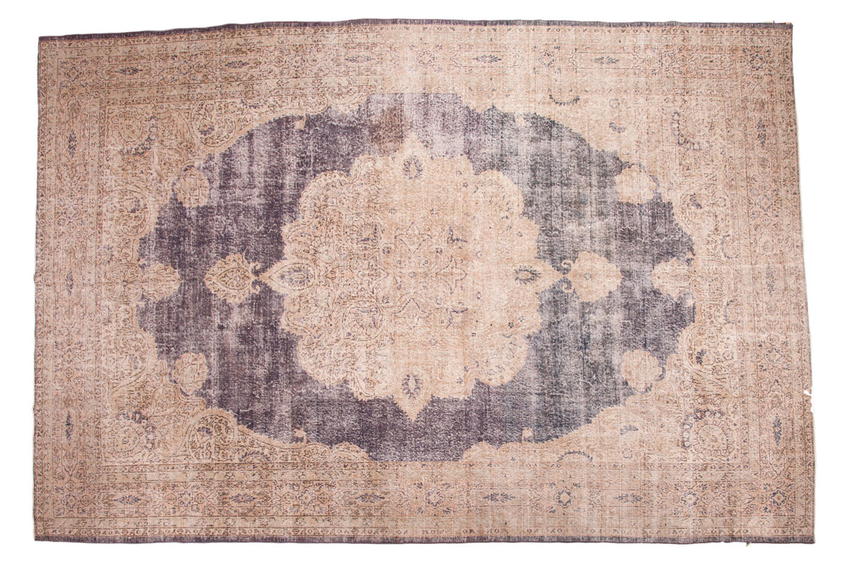 Designer distressed Oushak carpet, faded purple-blue medallion, ivory oversized border, 9'9" x 14'5".