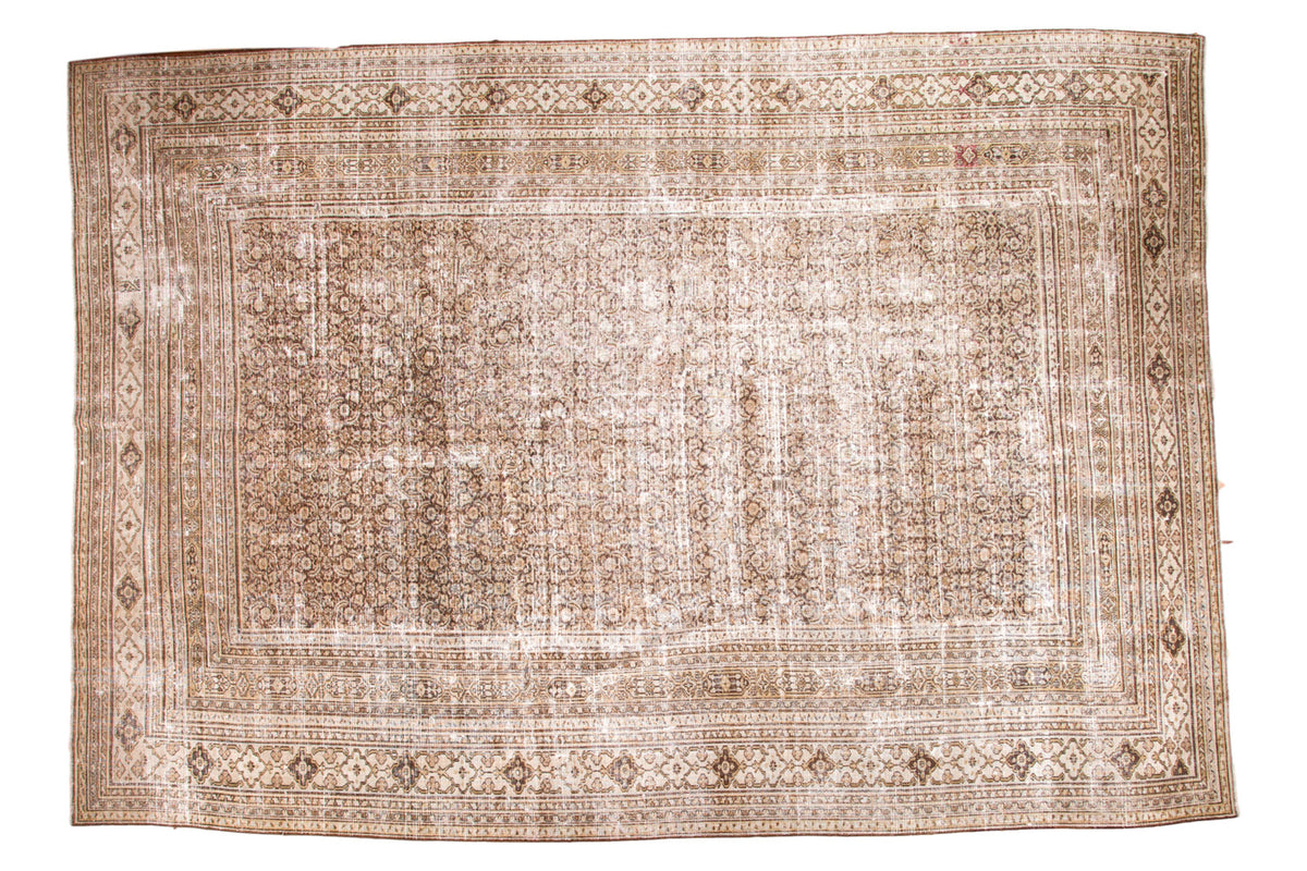 Distressed vintage Khorassan carpet with allover pattern in soft charcoal, cream, and silver, 10'2" x 14'2".